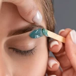 Service brow wax